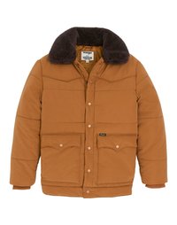 Bruine pufferjas met een donkerbruine nepbontkraag, drukknoopsluiting, twee voorzakken, geribde manchetten en een doorgestikte textuur.