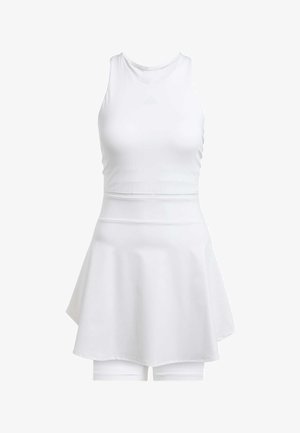 White athletic dress with a fitted bodice and flared skirt, made from smooth fabric. Includes built-in shorts and features a subtle logo.