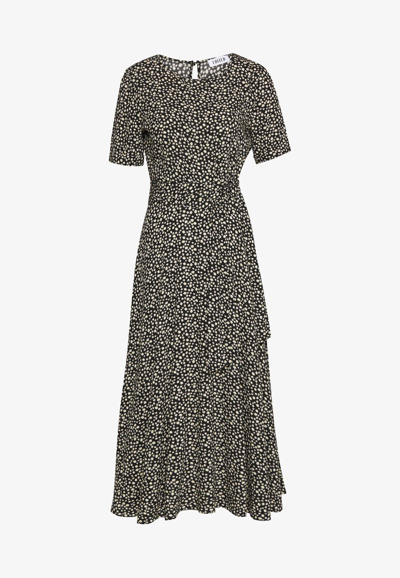 Robe midi noire à manches courtes, taille cintrée, avec imprimé floral de petites marguerites blanches sur toute la surface.
