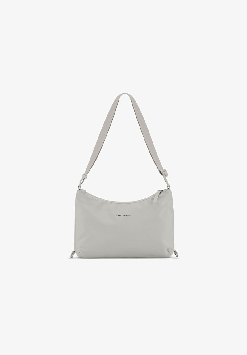 Borsa a spalla grigia realizzata in tessuto liscio. Presenta una forma arrotondata, tracolla regolabile e chiusura con zip con branding minimale.