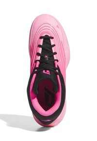 Pink athletic shoe featuring a smooth upper, black laces, textured accents, and a cushioned interior. Sole has a rounded shape.