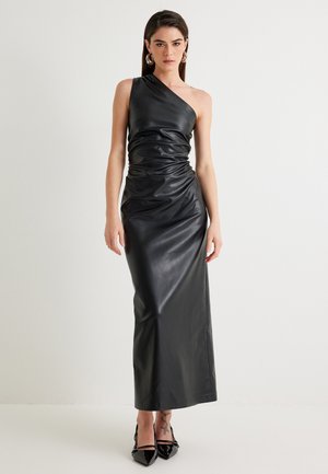 Black faux leather dress with a one-shoulder design, ruched detailing, and a floor-length silhouette. Features a smooth texture and sheen.