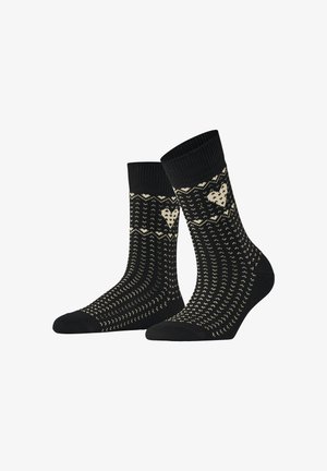 Ein Paar schwarze Socken mit cremefarbenen Herz- und Zickzack-Strickmustern, gerippten Bündchen und strukturierten vertikalen Streifen.