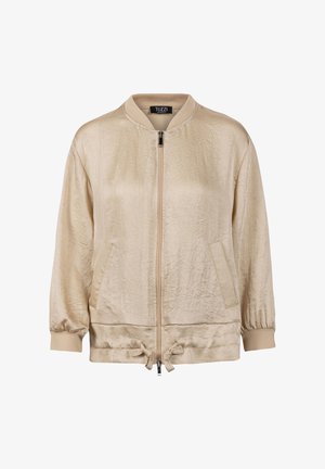 Beige bomber jacket with front zipper, ribbed collar and cuffs, side pockets, and adjustable drawstring hem.