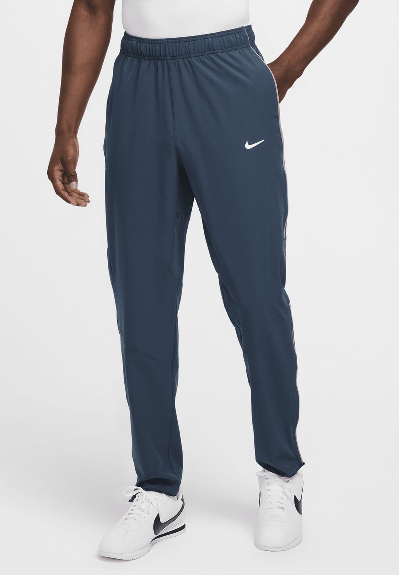 Nike Performance Pantalones deportivos - armory navy/plum dust/white