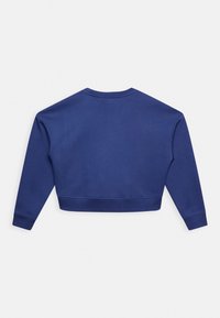 Sweatshirt azul-marinho cropped com mangas longas, apresentando um decote redondo e punhos e bainha canelados, feito de um tecido macio e texturizado.