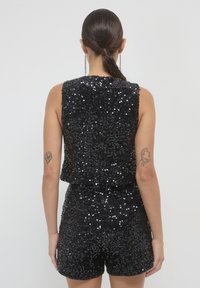 Calliope CULOTTE CON PAILLETTES  - Short - nero