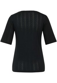 Musta lyhythihainen paita, jossa on tekstuuri, pyöreä pääntie ja hillityt pystysuorat raidat kankaassa.