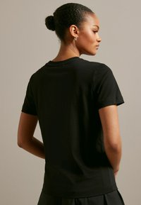 Next SHORT SLEEVE  REGULAR FIT - T-shirts print - black