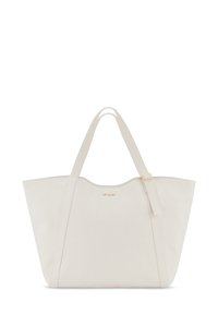 Sac de course en toile beige avec texture lisse, large ouverture et doubles poignées en tissu. Présente un logo discret et un design minimaliste.