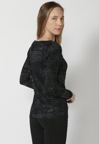 Koroshi Langarmshirt -    black