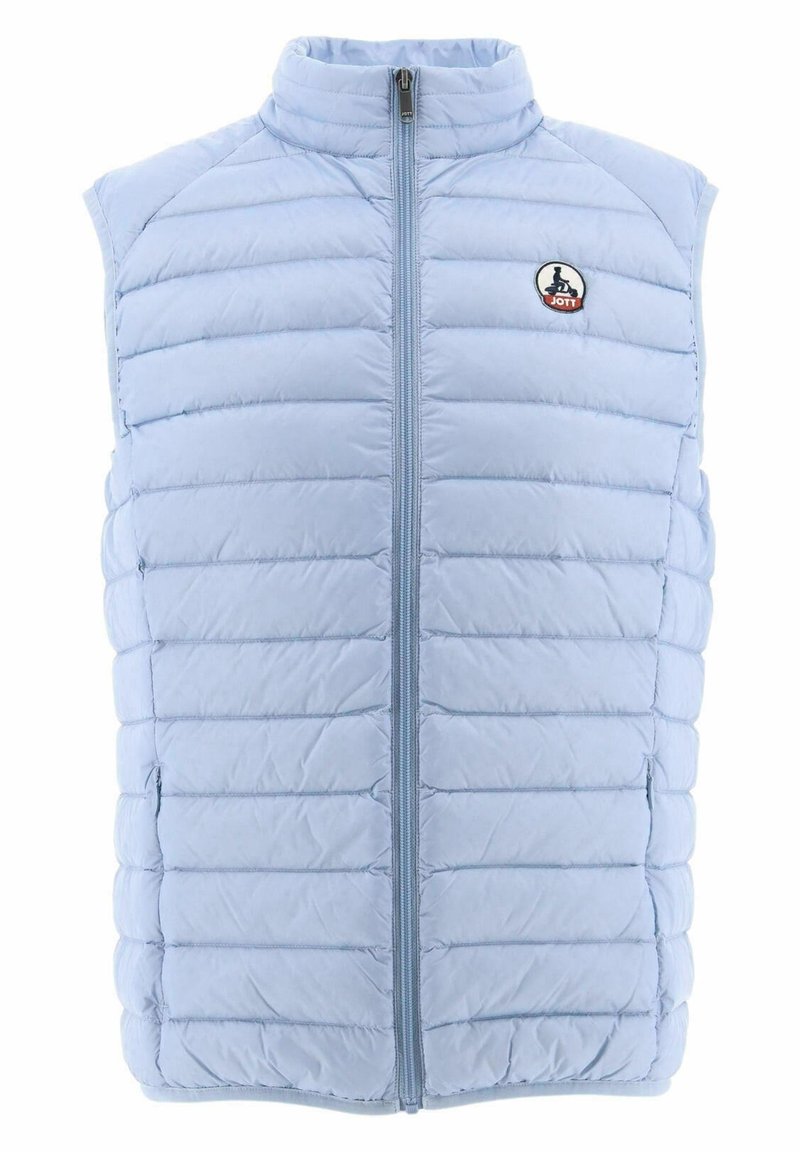 Ljusblå ärmlös väst med hög krage, kviltat mönster och framknäppning med dragkedja. Har en liten rund logotyp på vänster bröst.