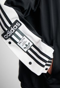 adidas Originals MEGABREAK - Training jacket - black