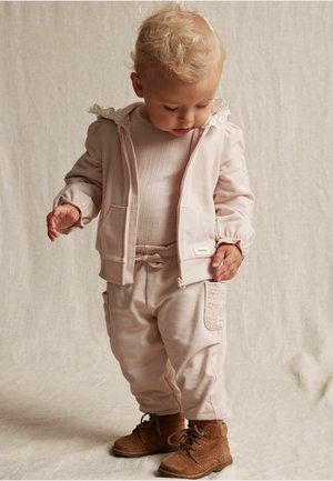 BYXOR MED  BLOMMIGT BRODERI - Tracksuit bottoms - light pink