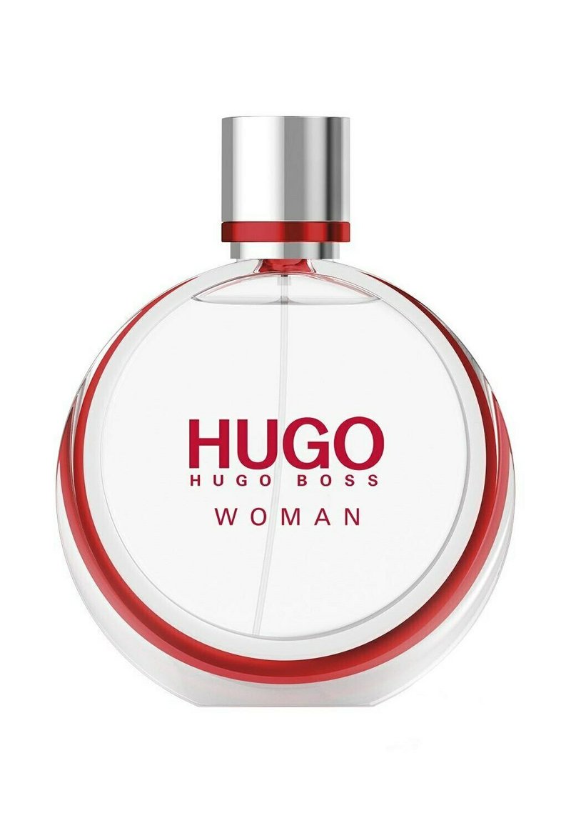 Helder glazen ronde parfumfles met rode accenten en een zilveren dop. Het etiket toont "HUGO HUGO BOSS WOMAN" in rode tekst.