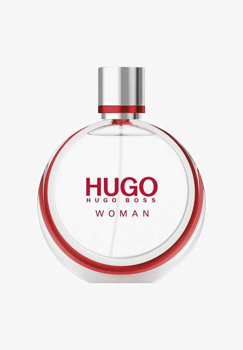 Helder glazen ronde parfumfles met rode accenten en een zilveren dop. Het etiket toont "HUGO HUGO BOSS WOMAN" in rode tekst.