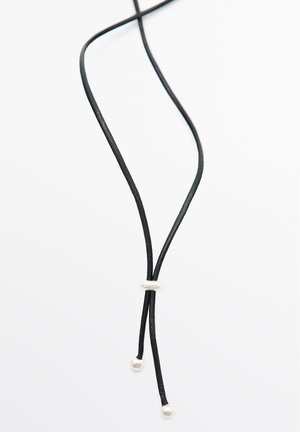 Black leather cord necklace featuring a silver accent bead, with two pearl-like ends. Smooth texture, minimalistic design, and adjustable length.