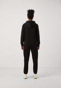 Champion GRAPHIC FULL ZIP HOODIE - Mikina so zipsom - black