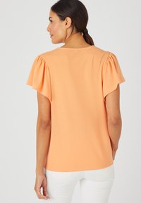 Damart Camiseta estampada - abricot