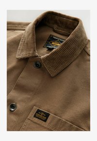 Ei valittu, tan grey