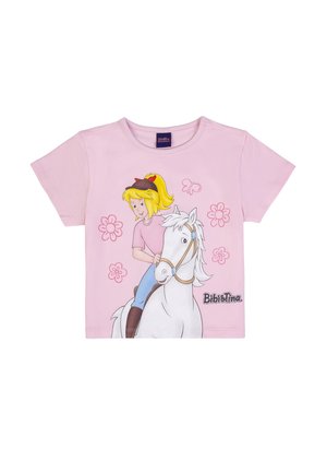 Light pink children's t-shirt with cartoon girl riding a white horse, surrounded by pink flowers and a butterfly, "Bibi & Tina" text.