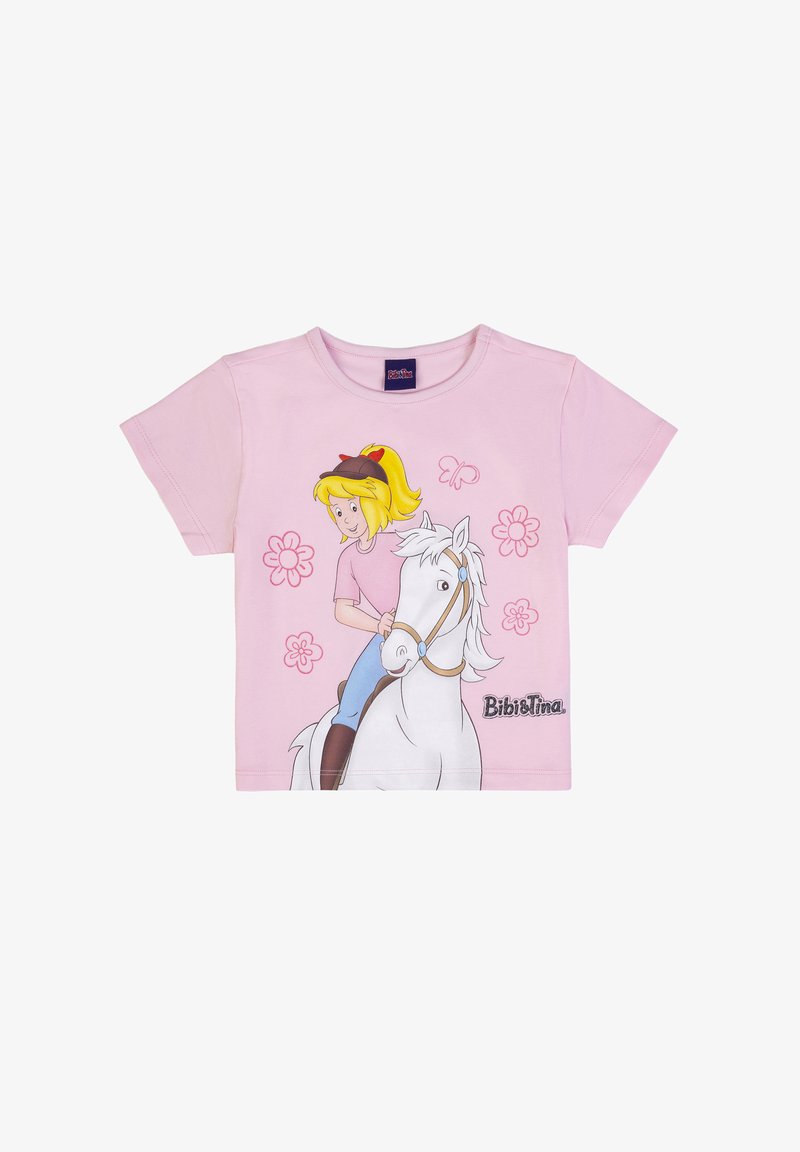 Maglietta rosa chiaro per bambini con disegno di una ragazza dei cartoni che cavalca un cavallo bianco, circondata da fiori rosa e una farfalla, con la scritta "Bibi & Tina".