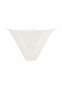 Spitzen- und Netzstring in sanftem Beige, mit einem tief sitzenden Design, ausgeschnittenen Seiten und einem kleinen Schleifendetail in der Mitte des Rückens.