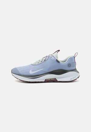 REACTX INFINITY RN 4 GTX - Road running shoes - blue-grey