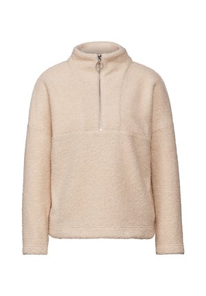Crème fleece pullover met hoge kraag, halve zipper en een gestructureerde oppervlak. Heeft een gestructureerde pasvorm en lange mouwen.