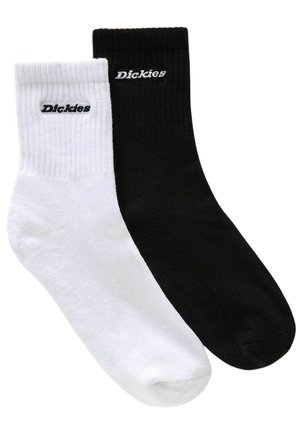 Crew-length socks in black and white, made from cotton blend. Features ribbed cuffs and embroidered "Dickies" logo on each sock.
