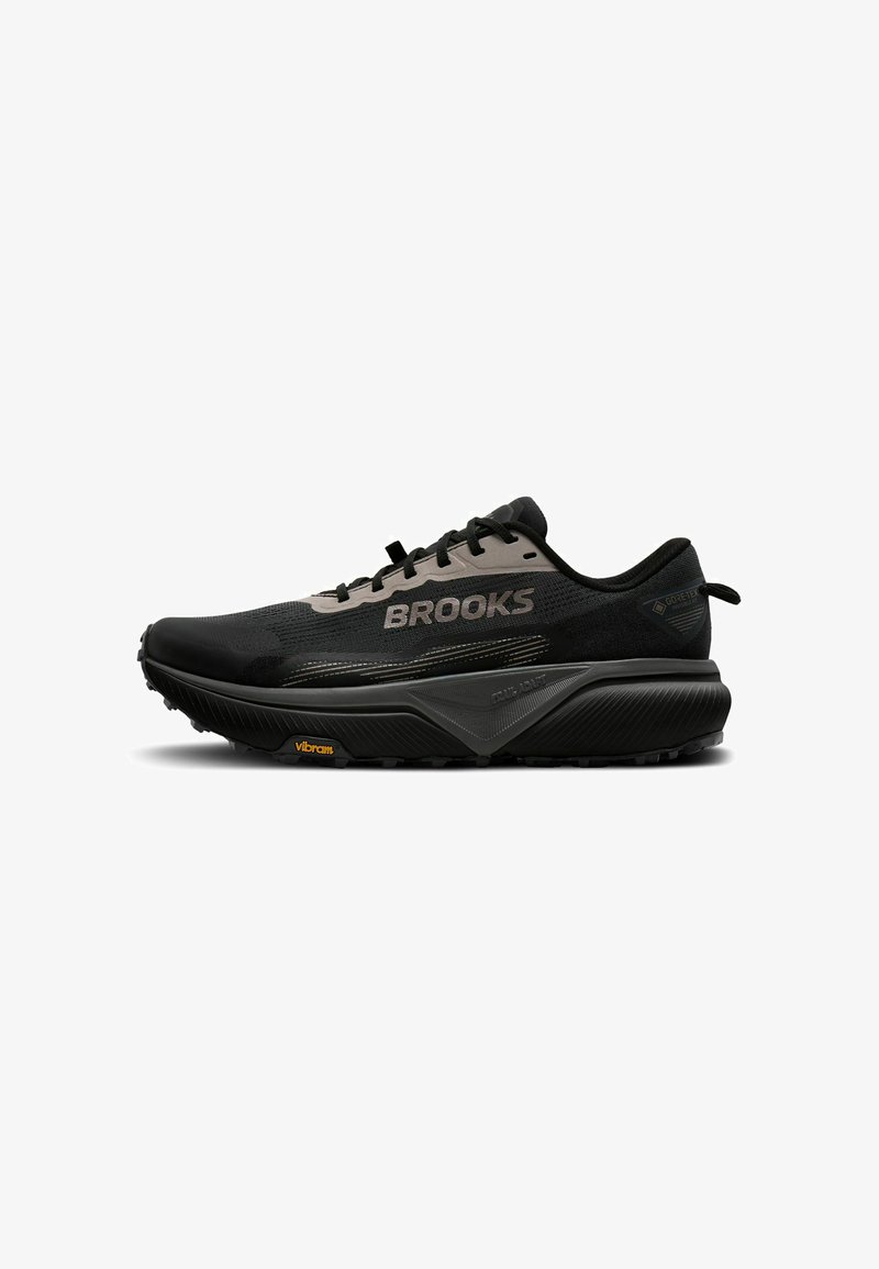 Black Brooks running shoe with thick sole, Vibram outsole, Gore-Tex label, and gray accents on upper mesh and laces.