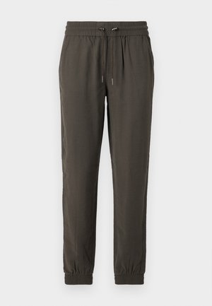 Tumedad rohelised jogger-püksid kergest kangast, millel on elastne vöökoht koos paelaga ja elastsed paelad pahkluude juures.