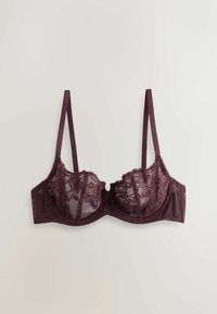 Sujetador de encaje malva con copas transparentes, bordes con forma de concha y tirantes ajustables. Presenta un patrón floral y varillas para soporte.