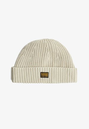 Gebreide crème kleurige muts met omgeslagen boord en een klein zwart-geel G-Star Originals-label aan de voorkant.