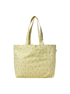 Hellgelbe Tragetasche mit kleinem gelbem Blumenmuster und zwei langen Schulterriemen vor weißem Hintergrund.