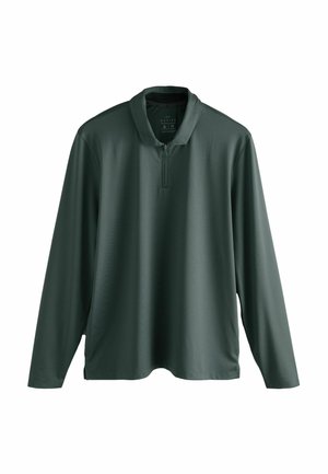 Long-sleeve polo shirt in dark green, made of textured performance fabric. Features a collared neck and a half zipper at front.