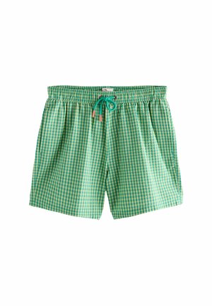 Groene en blauwe geruite zwembroek met elastische tailleband en turkooizen trekkoord, gecentreerd op een witte achtergrond.