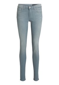 Jeans ajustados en denim azul claro, con una cintura a media altura, diseño clásico de cinco bolsillos y un ligero desvanecimiento. Textura suave sin patrones.