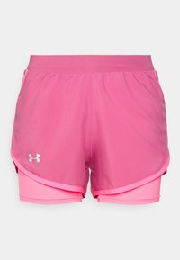 Rosa träningsshorts med en lagerdesign, där det finns ett lätt ytterlager och åtsittande inre shorts. Silverfärgad logotyp på vänster ben.