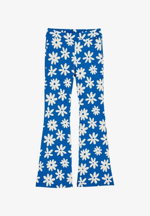 Blå flarebyxor med ett vitt tusenskönemönster, gjorda av mjukt tyg. Har en bred midjeband och en jämn yta genomgående.