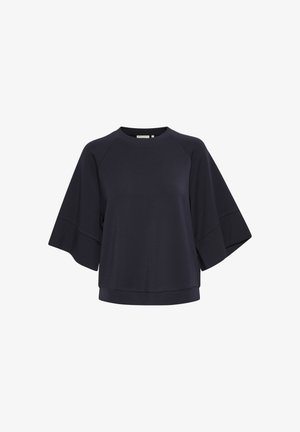 Pulover tamno plave boje, izrađen od mekane tkanine, s širokim rukavima, okruglim izrezom i opuštenim krojem s rebrastim rubom.