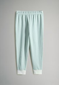 Šviesiai žali dryžuoti kelnių, su elastiniu juosmeniu ir baltais rankogaliais, pagaminti iš minkštos medžiagos, turintys prigludusį dizainą.