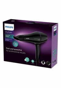 Asciugacapelli Philips DryCare Pro nero con dettagli viola, 2200W, dotato di ugello concentratore e impugnatura testurizzata per un uso facile.