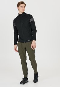 Endurance TIGHTS JEEN - Jogginghose - ivygreen