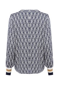 Maglietta a manica lunga blu navy con un motivo geometrico bianco, scollo rotondo e polsini a coste in blu navy, crema e accenti dorati.