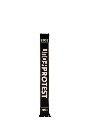 Black scarf with white lettering reading "SOI7 PROTEST" vertically, "2015" at the top, and "1993" at the bottom with fringed ends.