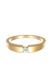 Guld-tone ring med et minimalistisk design, der har en central klar ædelsten og en delt ring, markeret med "925" for sølvindhold.