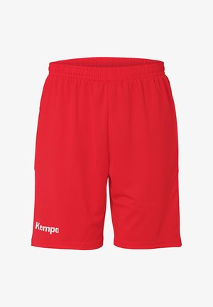 Rode sportshorts gemaakt van lichtgewicht stof, met een elastische tailleband en een wit "Kempa" logo aan de onderkant van het linkerbeen.