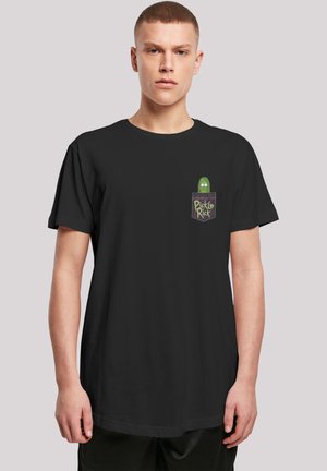 Black cotton t-shirt featuring a graphic of a green pickle with cartoon eyes in a pocket design with the text "Pickle Rick" underneath.
