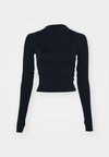 TIGHT FIT - T-skjorte til trening - black